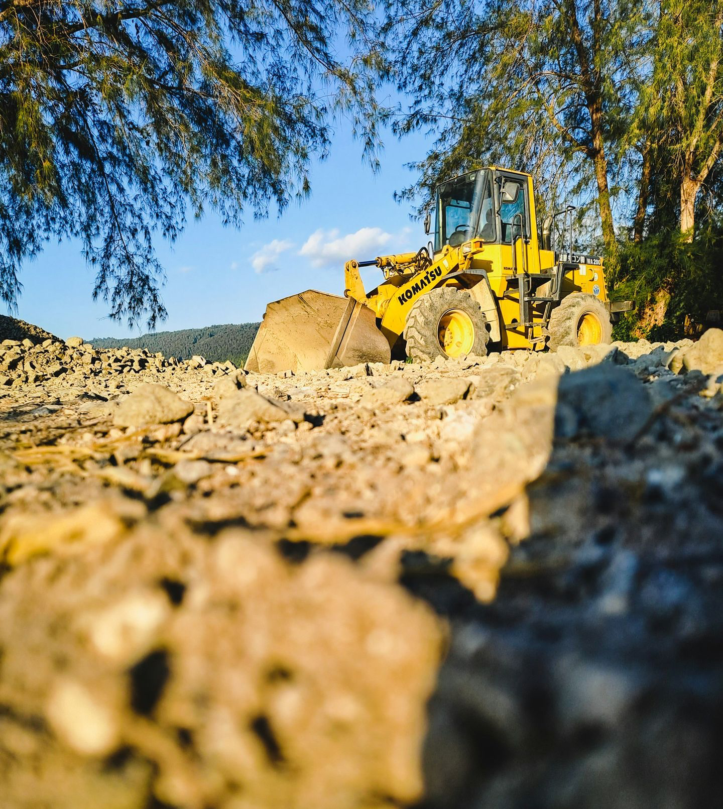 a tractor in a pile of dirt